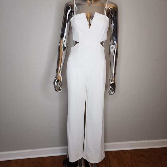 Forever 21 Pants - Forever 21 white cutout one piece jumpsuit size medium